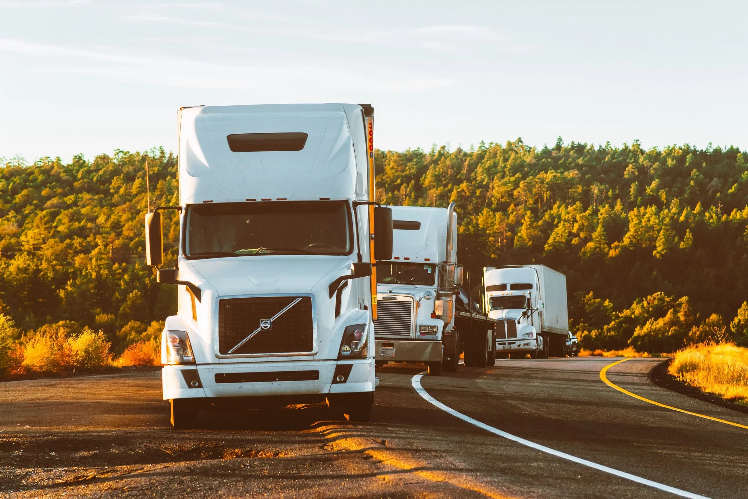 Freight trucks on the road, mid-run