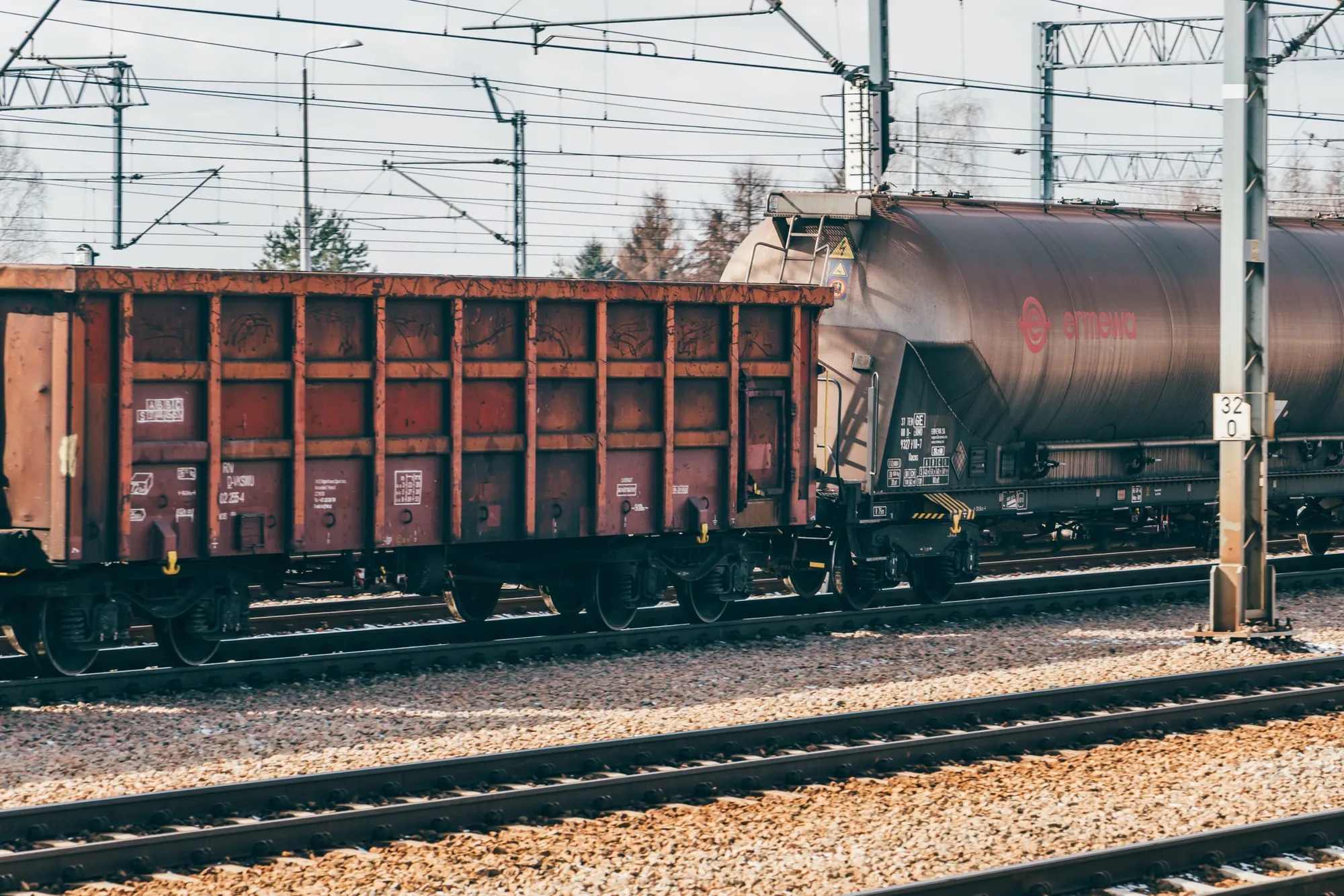 Freight wagons lined up on tracks in a marshalling yard